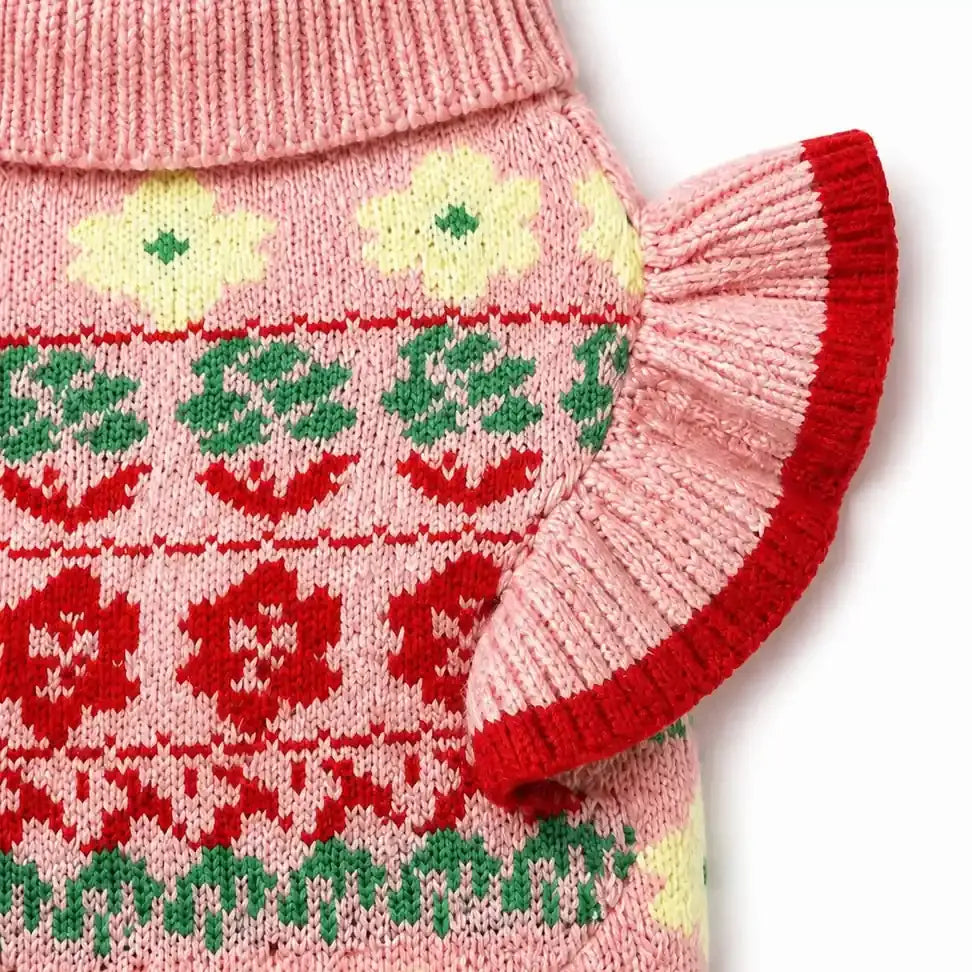 Close detail of Pink Floral Ruffle Dog Sweater showing visible texture and construction