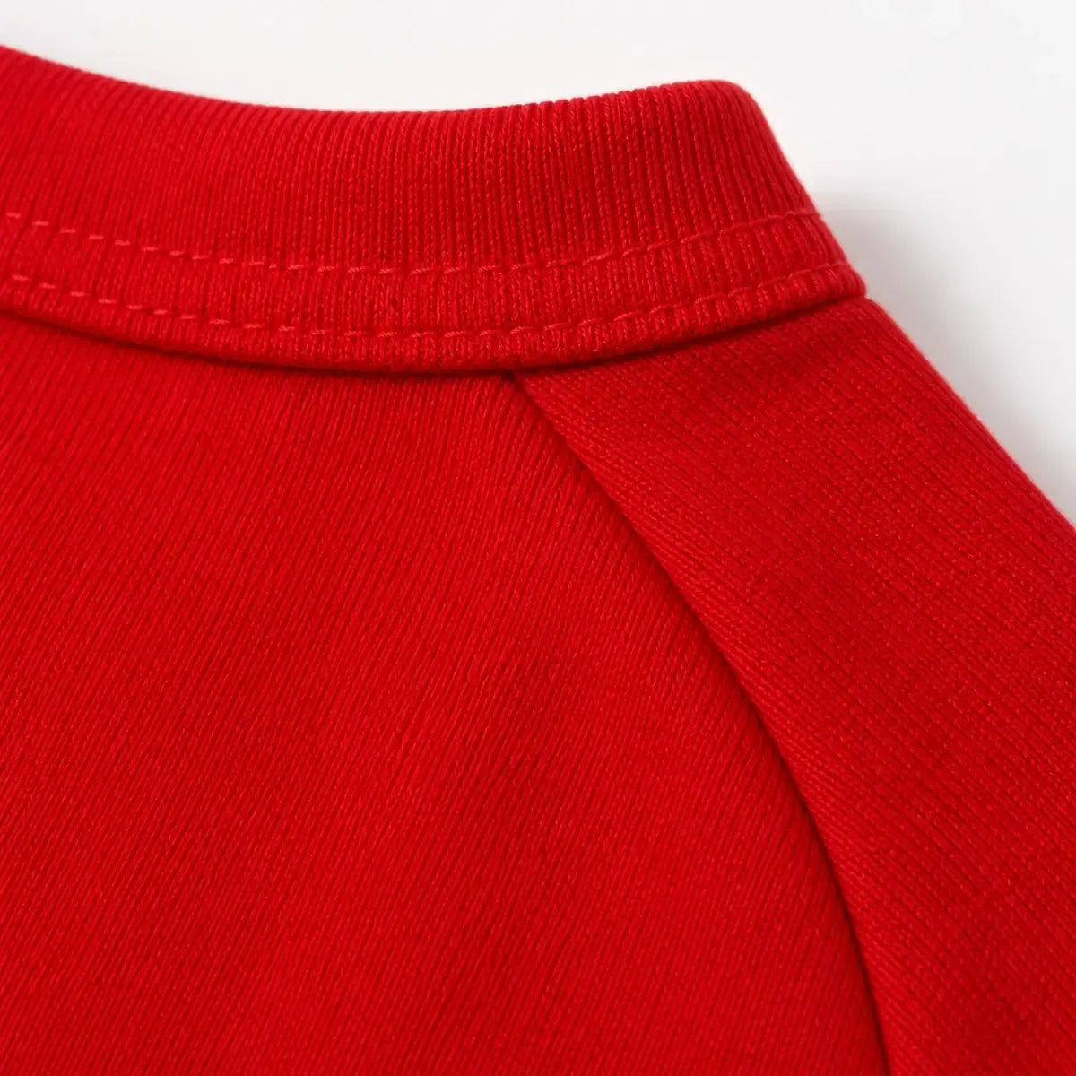 Close detail of Black and Red Dog Sweatshirt showing visible texture and construction