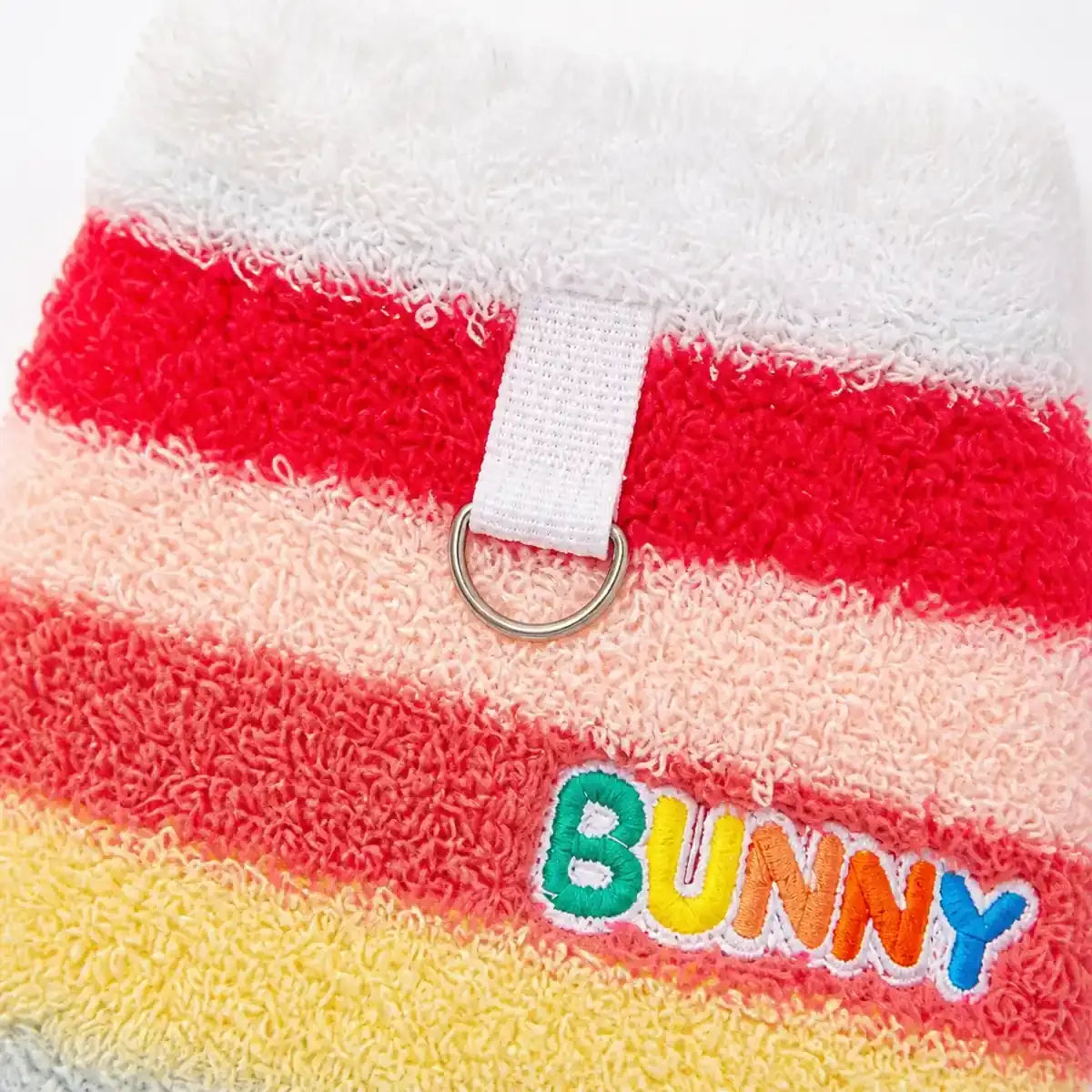 Close detail of Rainbow Stripe Dog Vest showing visible texture and construction