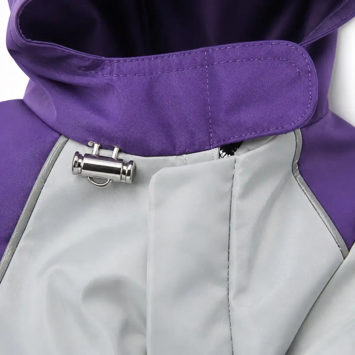 Close detail of Colorblock Utility Dog Raincoat showing visible texture and construction