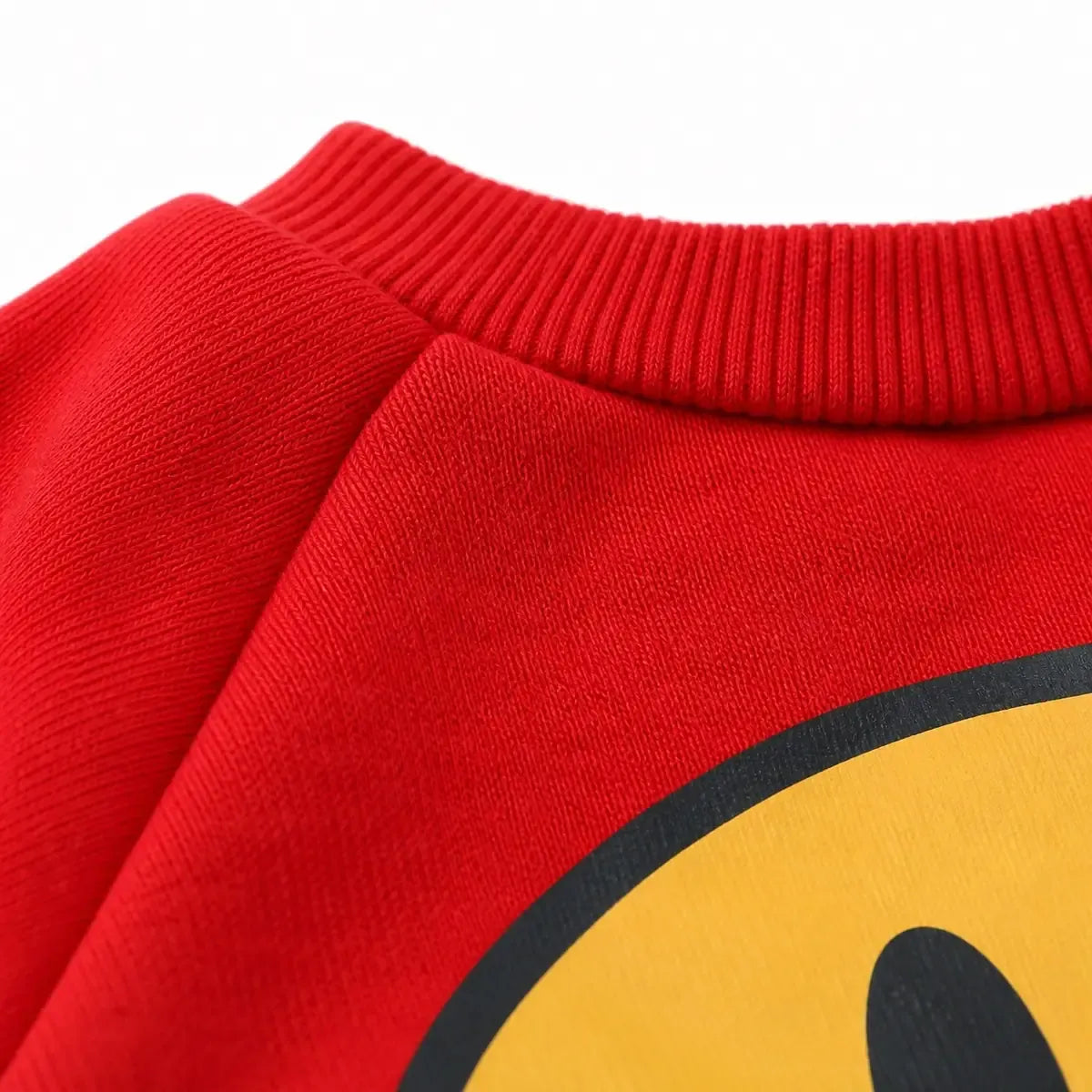 Close detail of Smile Patch Pet Sweatshirt showing visible texture and construction