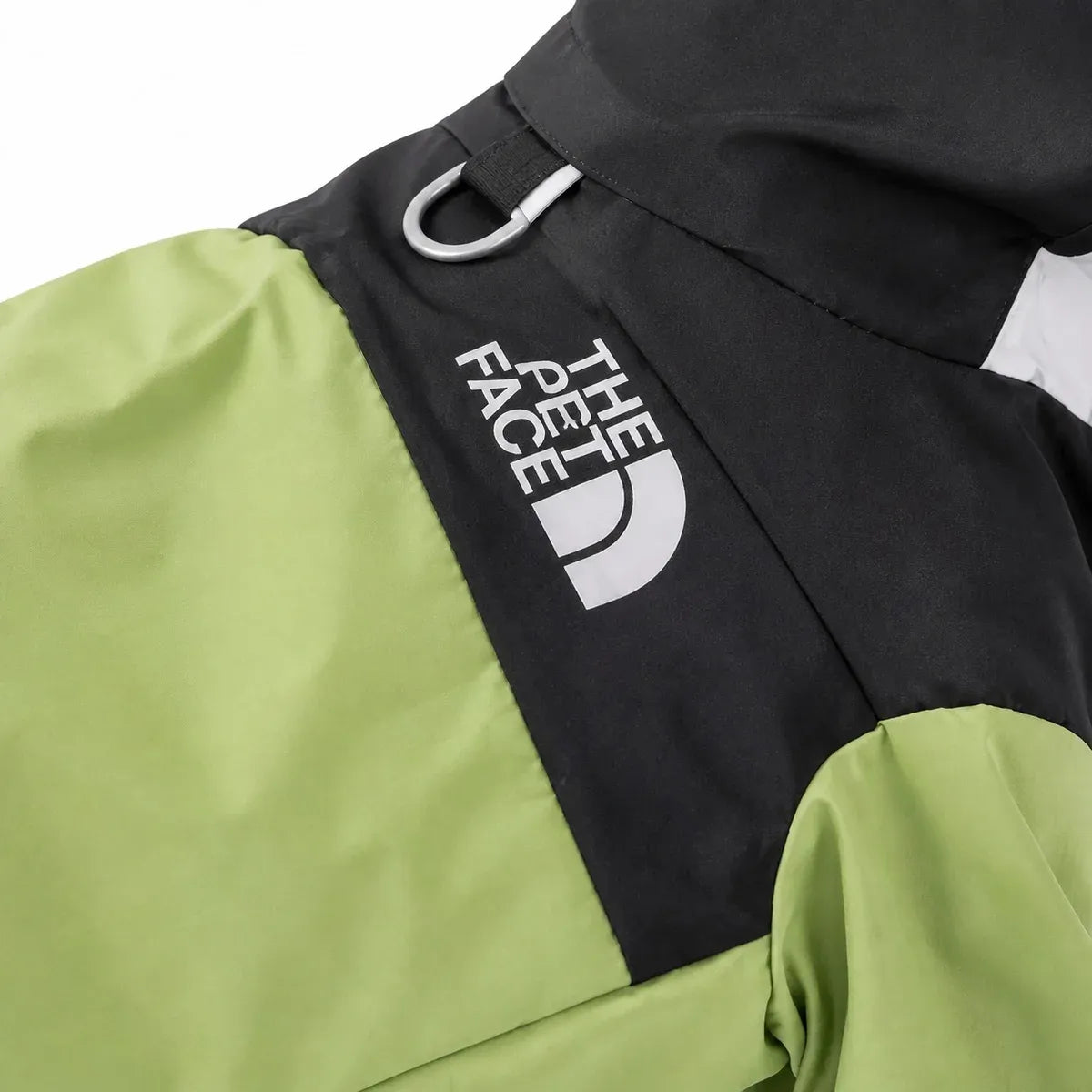 Close detail of Colorblock Full-Coverage Dog Raincoat showing visible texture and construction