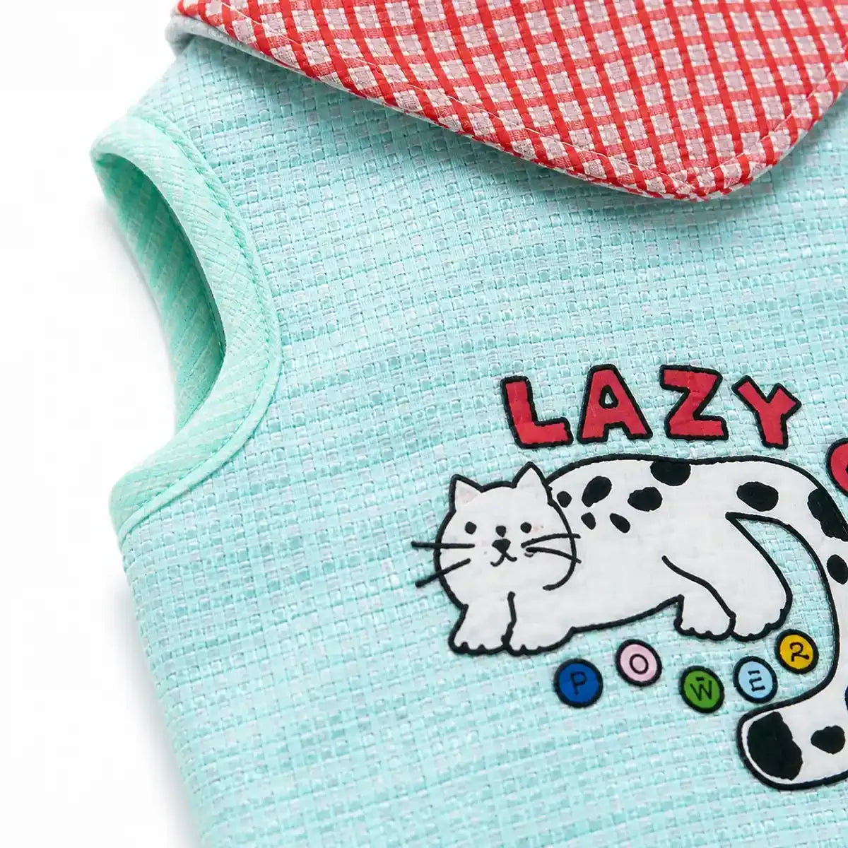 Close detail of Printed Cat Bib Vest showing visible texture and construction