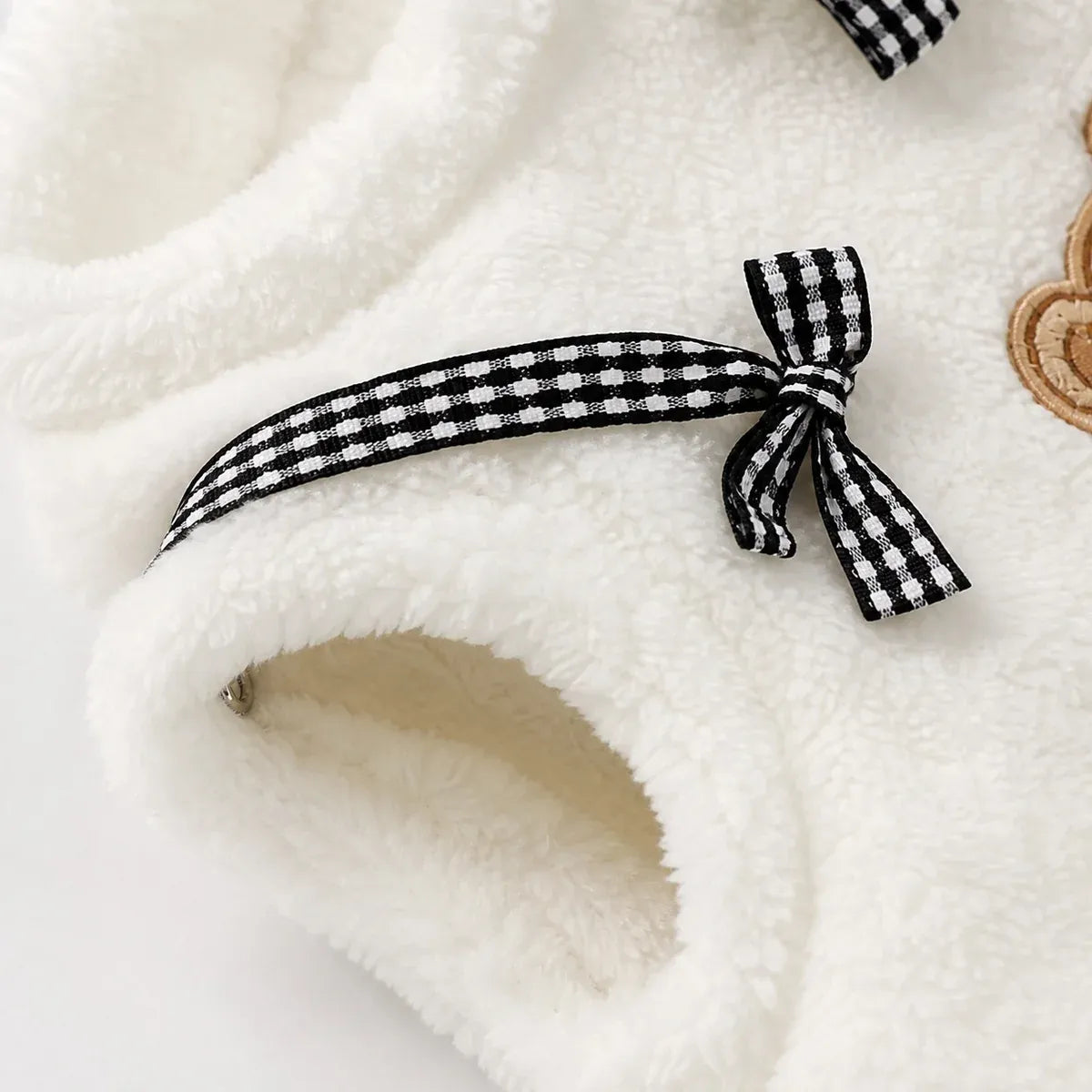 Close detail of Plaid Cat Vest showing visible texture and construction
