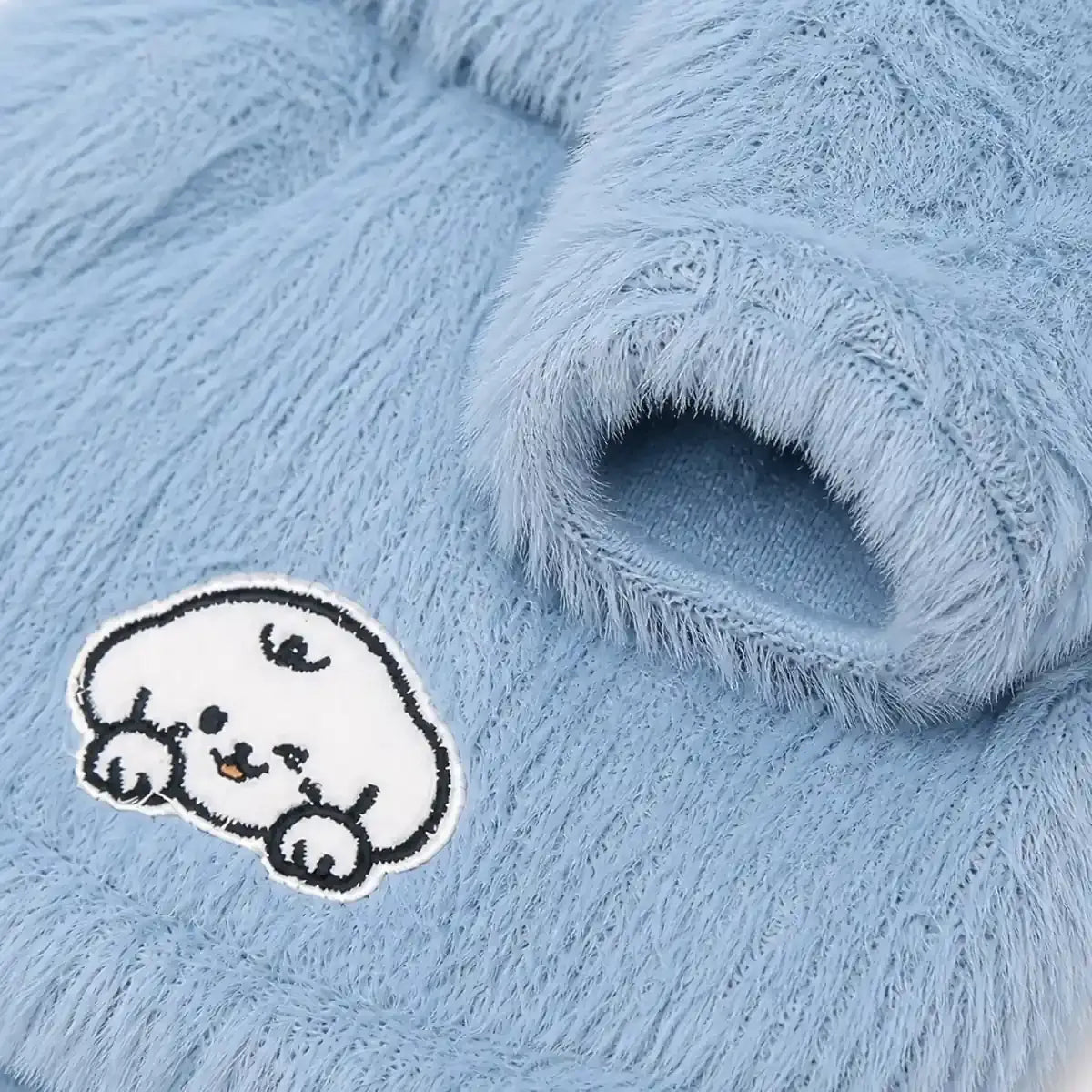 Close detail of Three-Color Hooded Cat Sweatshirt showing visible texture and construction