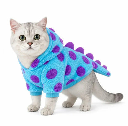 Aqua Blue (Purple Spots, Short) dinosaur fleece pet costume worn by a cat on a white background