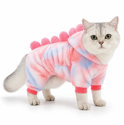 Pink (Blue Pastel) dinosaur fleece pet costume worn by a cat on a white background
