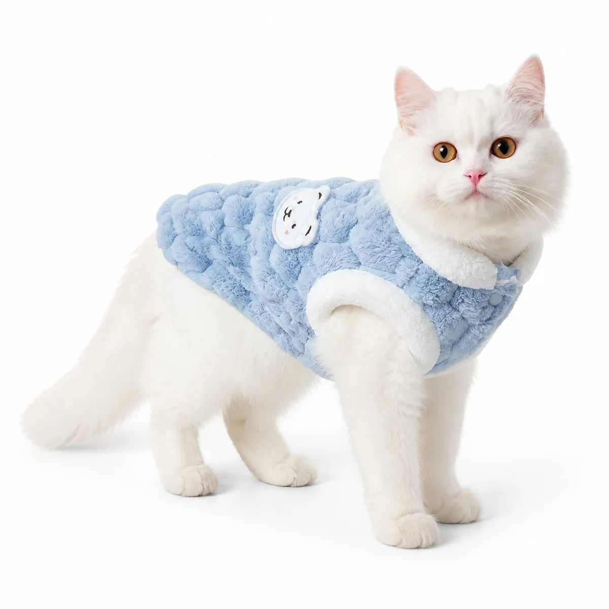 Blue plush pet vest worn by a pet on a white background