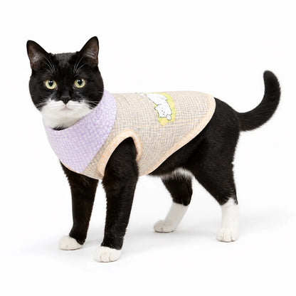 Yellow printed cat bib vest worn by a pet on a white background