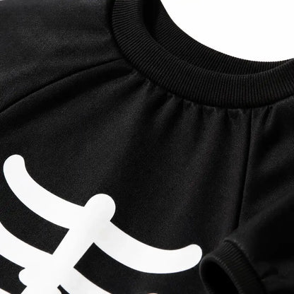 Close-up of the black skeleton dog costume neckline and fabric detail